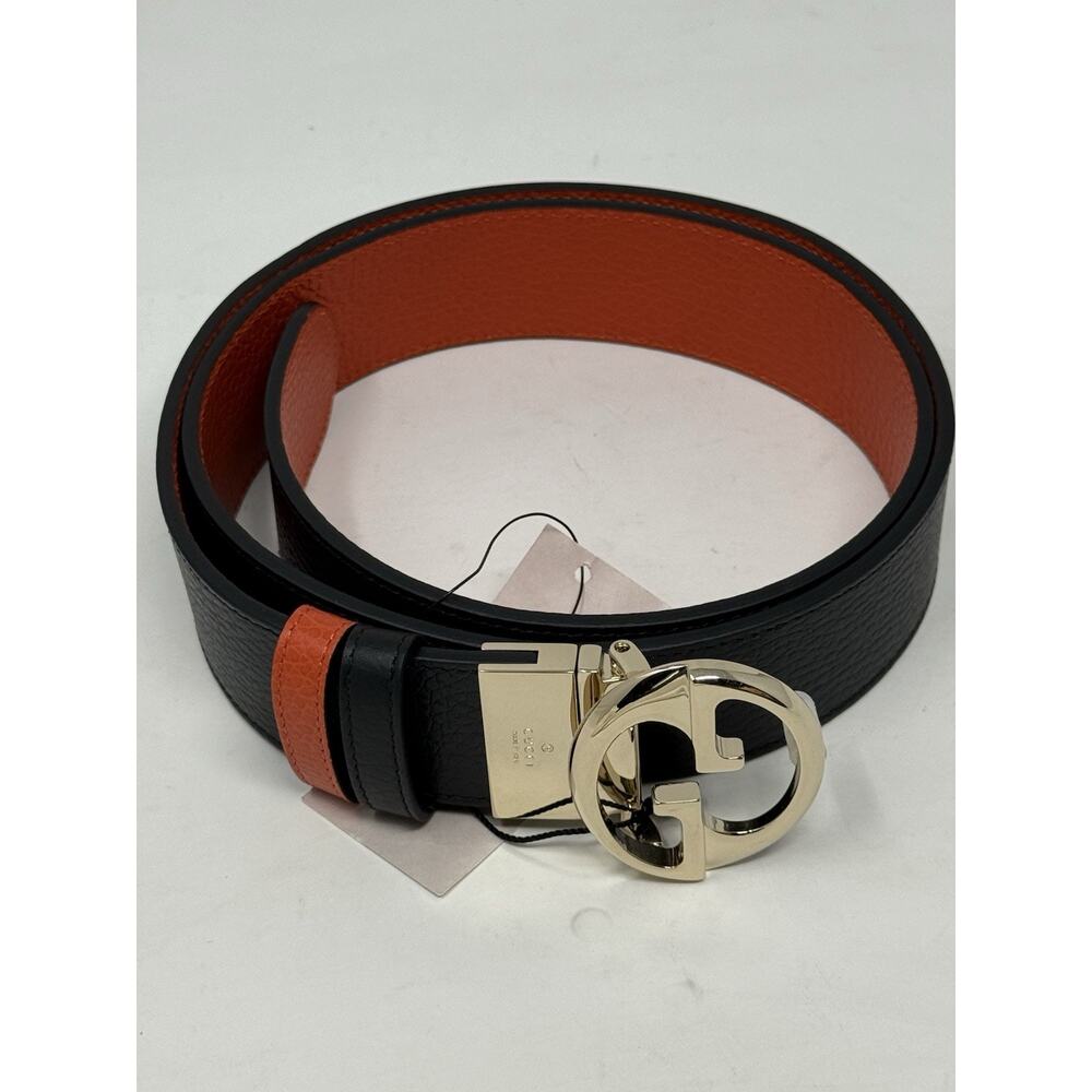 Gucci belt women’s size extra small orange reversible black